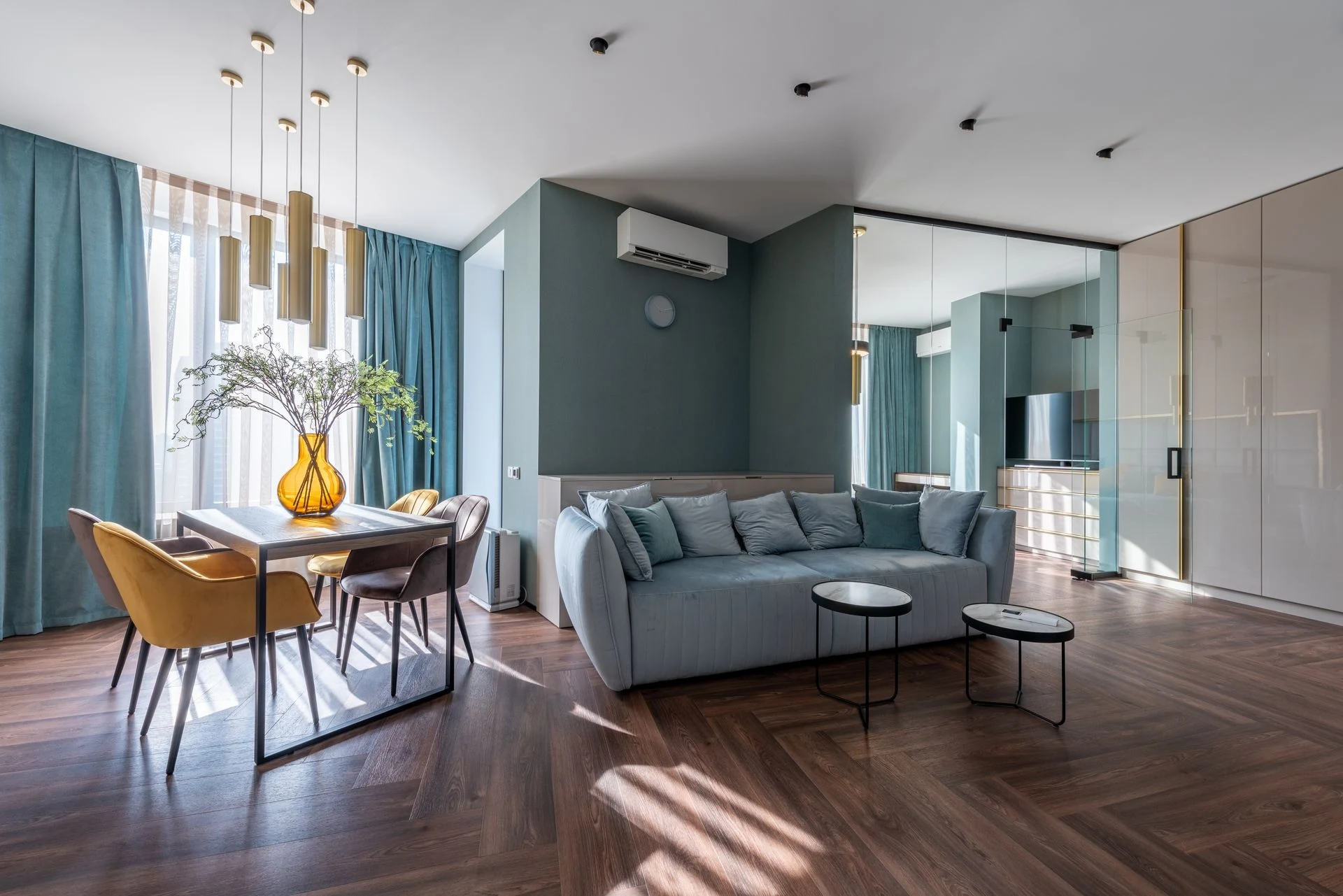 A modern apartment interior with a seating area
